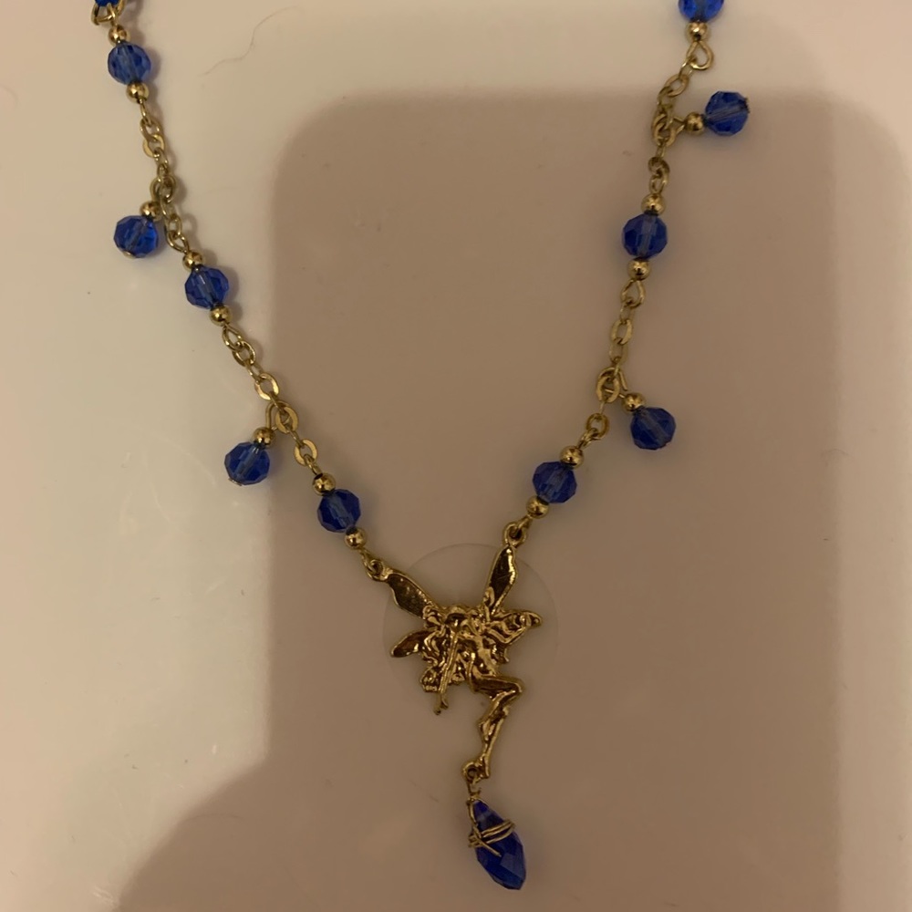Fairy with blue stone necklace Satin ribbon with gold plated metal NWOT